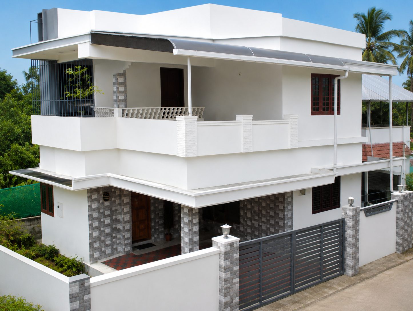 Completed modern G+1 home built by Legacy Homes in Thrissur, Kerala